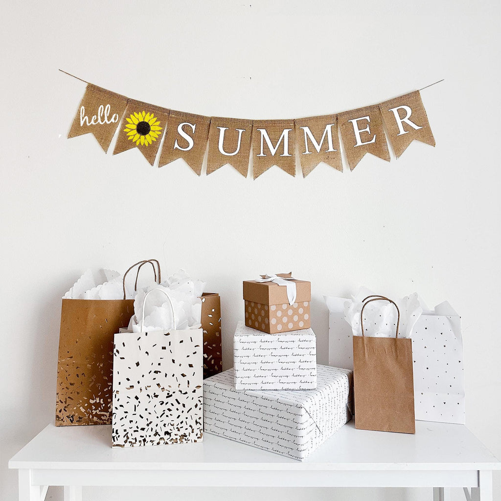 Hello Summer Sunflower burlap flag banner features hello painted in white script lettering, followed by a vibrant sunflower then the remaining flags spell out the word summer.