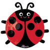 A red and black cartoon-style ladybug balloon with large eyes and a smiling face.
