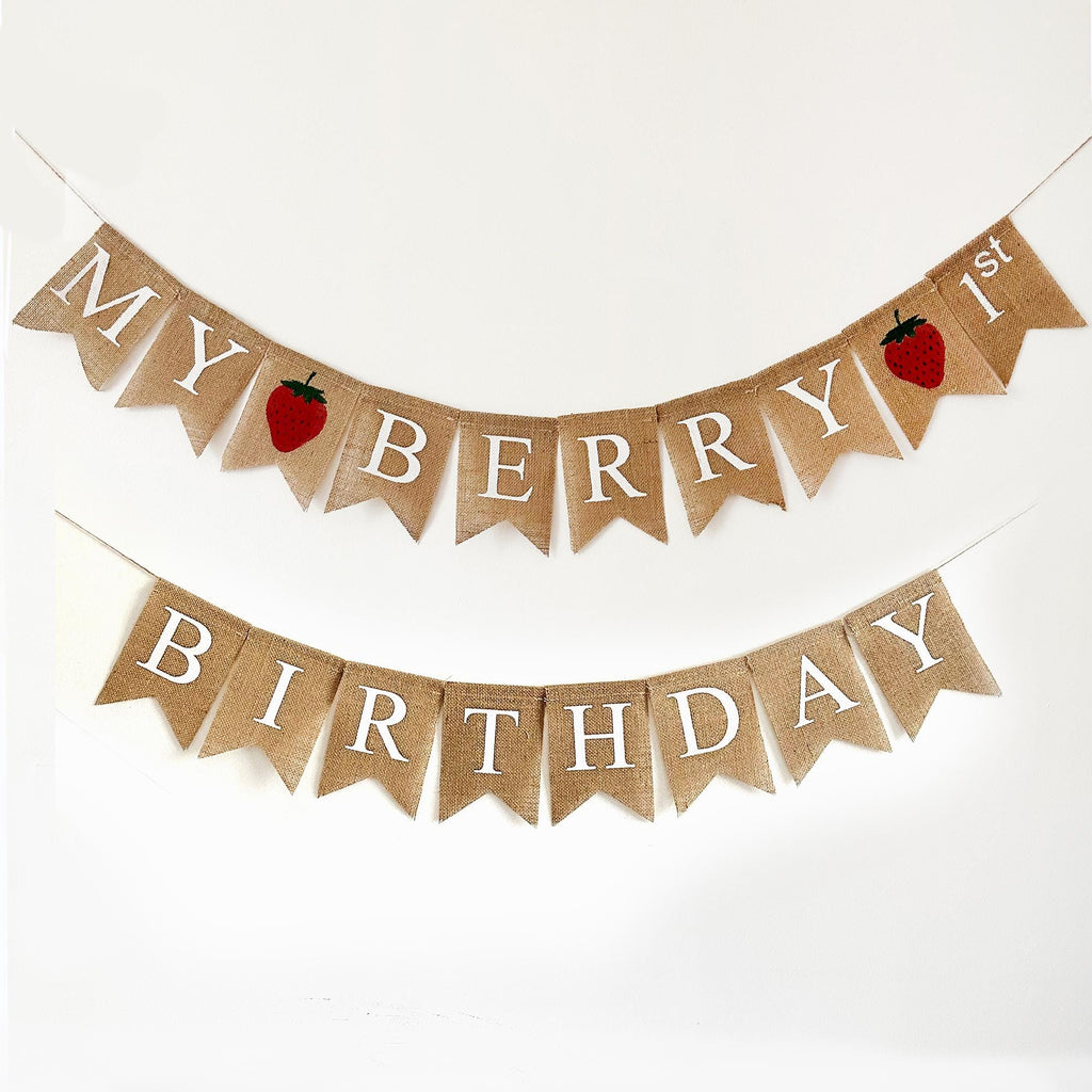 A banner with the text "MY BERRY BIRTHDAY" written on it, along with two red strawberries.