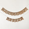 A banner with the text "a little duckling is on the way" hanging on a wall.