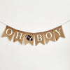 A banner with the word "OH BOY" written on it, with a football image between the words.