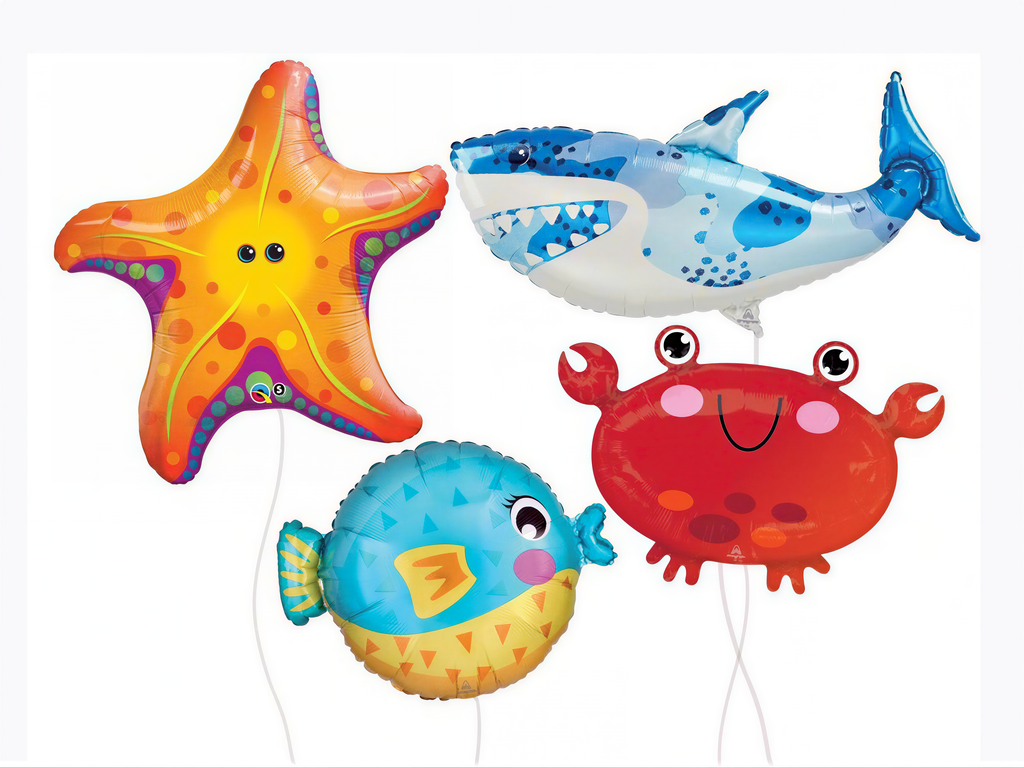 four colorful balloons shaped like sea creatures, including a starfish, a shark, a crab, and a fish.