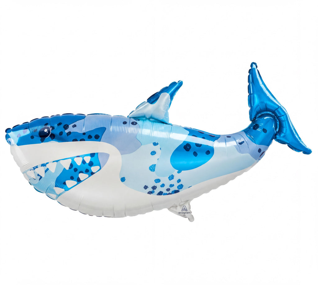 A blue and white inflatable balloon in the shape of a shark.