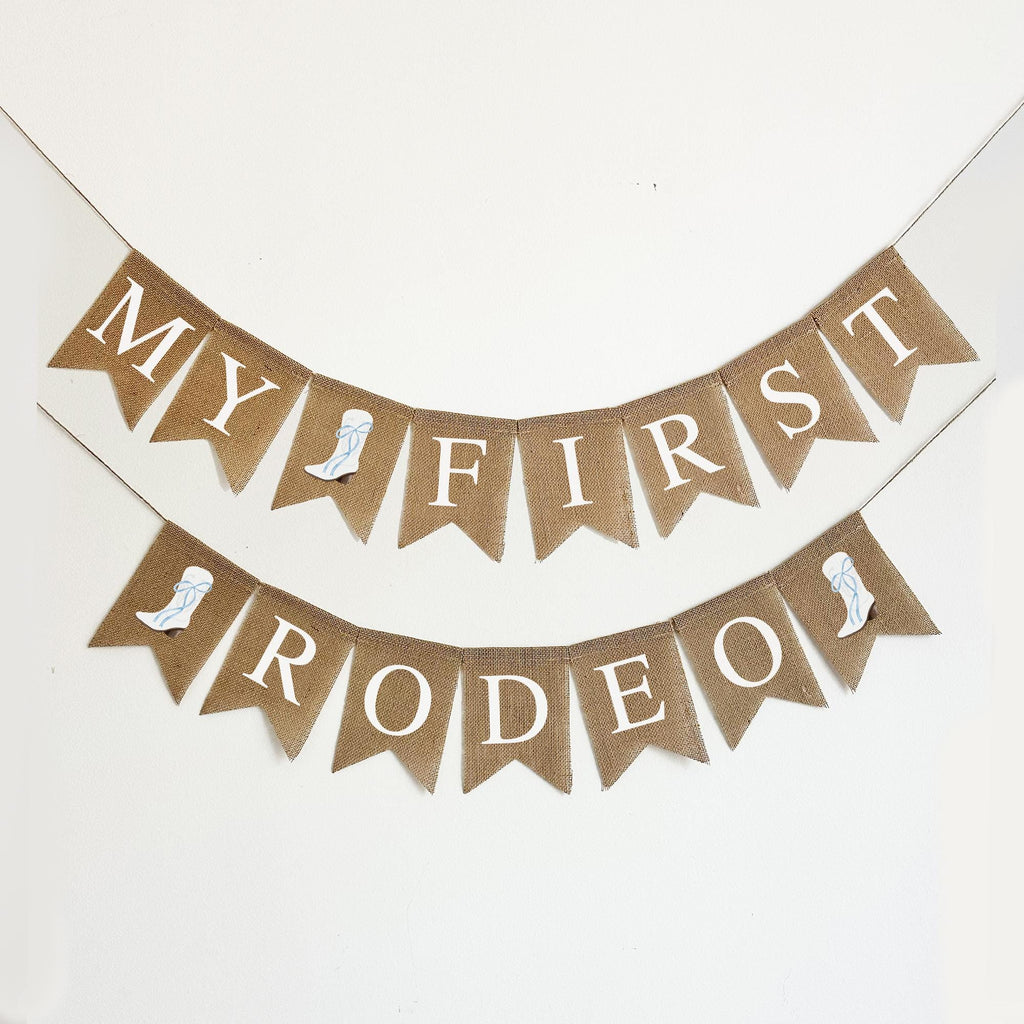 A banner with the words "MY FIRST RODEO" written on it, along with small images of cowboy boots.