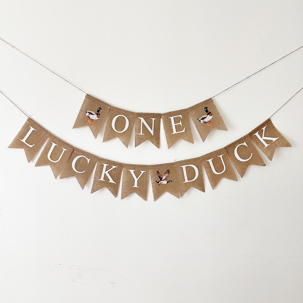 A banner with the word "Lucky Duck" written on it, along with a small image of a duck.
