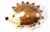 A brown hedgehog balloon is shown against a white background.