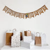 A burlap banner that says "Sweet Baby" with a sweet blueberry accent.