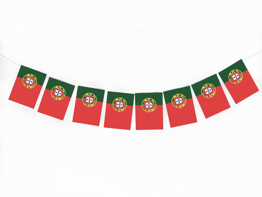 A row of red and green flags with the national emblem of Portugal displayed on them.