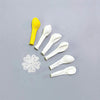 a yellow balloon and five white balloons arranged on a gray background.