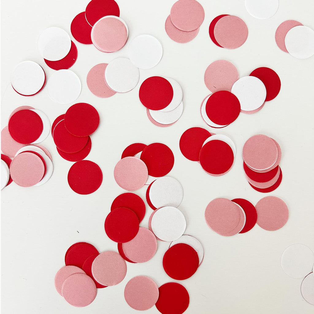numerous red and white circles scattered across a white background.
