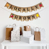 This is a burlap banner made of small fishtail flags with the word Locally on the top string. A peach is on the left and a strawberry is on the right. The bottom string has the word Grown with an apple on the left and a lemon on the right.