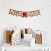 A burlap banner with white text that reads Pig Out with a red burlap banner with a pig silhouette stenciled on the middle. Perfect for a Backyard BBQ Party, Summer birthday or baby shower.