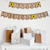 In white text, the banner in on two lines. The first line has a yellow sunflower flag followed by the word happy with another sunflower at the end. The second line reads mothers day with a sunflower in between each word.