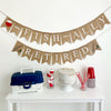 A two tiered burlap banner. The first tier reads ofishally with a red and white fishing bobber as the o. The second tier reads retired with a fishing rod and fish image on either side of the word.