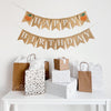 A burlap banner made from 4.5 by 6.5 inch fishtail shaped flags. The top line says HAPPY in white capital letters and has an orange pumpkin with a green stem on each end of the word. The bottom line says BIRTHDAY in white capital letters.
