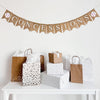 A burlap banner made from 4.5 by 6.5 inch fishtail shaped flags. The flags spell out the word CONCESSIONS in white capital letters and there is an image of a hand stenciled baseball on each end.