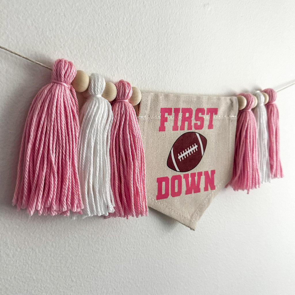 First Down Pink Football 1st Birthday Tassel Banner