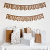 First Holy Communion burlap banner. The first line reads First Holy with a white cross in the middle of the two words, second line reads Communion. The banner is made of burlap with white lettering and the hand stenciled cross add the perfect touch to make this banner perfect for your special celebration.