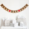 This banner consists of fishtail burlap flags with black letters that spell out the words BEST DAY EVER. In between each word is a red heart on a burlap fishtail flag. There are 2 red hearts in total. This banner is perfect for a wedding photo booth back drop!