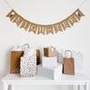 A burlap banner made from 4.5 by 6.5 inch fishtail shaped flags. Each flag has a pocket across the top for stringing. It says EIGH-TEE in white capital letters and has a hand stenciled image of a white golf ball sitting on a black tee on each end. It is strung on a jute string that is 110 inches in length.