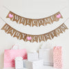 A burlap banner made from 4.5 by 6.5 inch fishtail flags. The top line says WELCOME in white capital letters and has a pink pumpkin on each end. The bottom string says BABY with your choice of custom name and has a pink pumpkin in the middle.