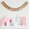 Miss to Mrs burlap banner is written out in white letters on fishtail burlap flags. Between each word there is a hand stenciled pink heart. This banner is perfect for a bridal shower, bachelorette or engagement party.