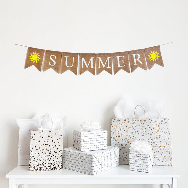 Summer Burlap Banner. Summer is written in white lettering on burlap flags with a hand stenciled yellow sunshine on each end of the word.
